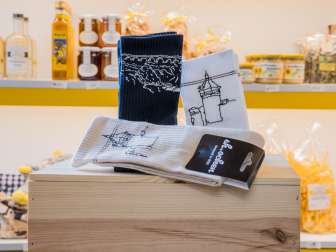 Hohe Socken mit Lineart des Munot oder des Rheinfalls.